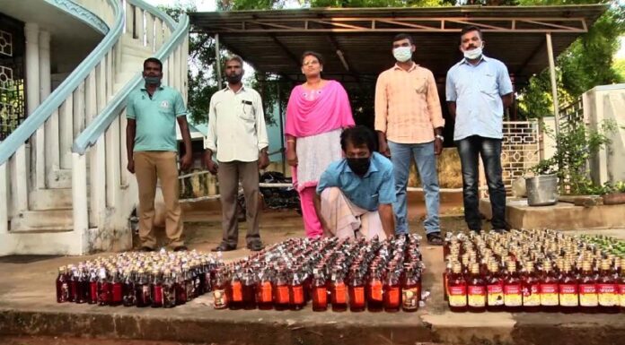 வயலுக்குள் மது பதுக்கல்: வாலிபரிடமிருந்து 600 பாட்டில்கள் பறிமுதல்